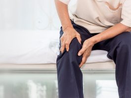 Health Problem Concept Old Woman Suffering From Knee Pain Home