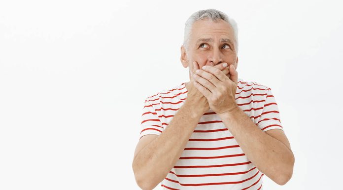 Shocked Senior Man Shut Mouth Concerned Looking Upper Left Corner (1)