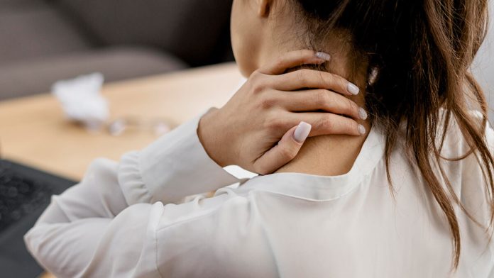 Young Woman Having Neckache While Working Home